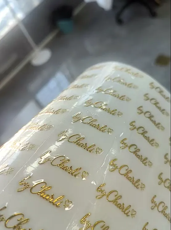 Logo turned into gold hot-foil labels